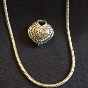 Heart sterling silver and 18 inch chain.
